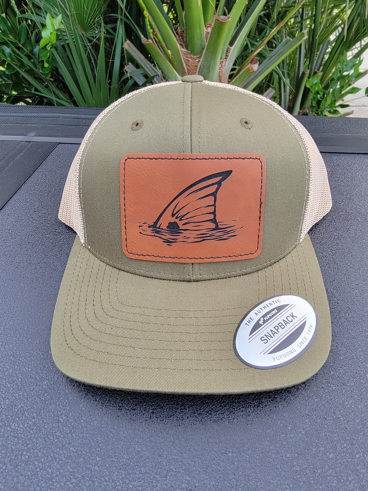 Laser Engraved Tailing Redfish Patch Trucker Hat